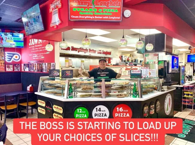 Inside Johnny Longhots Voorhees, with its pizza counter and Philly memorabilia